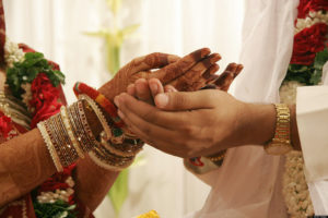 The Hands Of An Indian Gujarati Bride And Bridegroom, A Ritual Performed In An Indian Gujarati Wedding, India