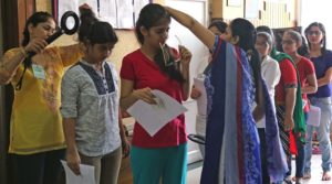 School Staff checking  the applicants before entering for NEET Exam at Ajit Karam Singh International School in Sector 41 of Chandigarh on Sunday, July 24 2016. Express Photo by Kamleshwar Singh *** Local Caption *** School Staff checking  the applicants before entering for NEET Exam at Ajit Karam Singh International School in Sector 41 of Chandigarh on Sunday, July 24 2016. Express Photo by Kamleshwar Singh