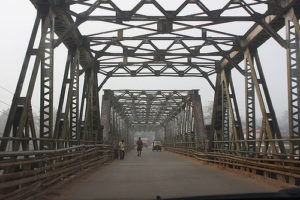 keralanews the iron girdar of iritty bridge collapsed on the top of the bus