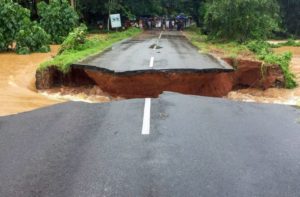 Malappuram: A section of Nilambur- Karad road is seen washed away following a flash flood, triggered by heavy rains, at Malappuram in Kerala on Thursday, August 09, 2018. (PTI Photo)(PTI8_9_2018_000233B)