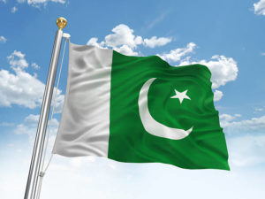 Waving Pakistani flag against cloudy sky. High resolution 3D render.