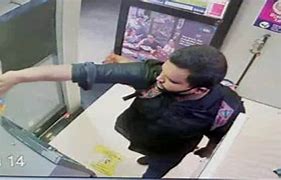 keralanews attempt to set fire to sbi atm in kochi kalamassery visuals of young man out