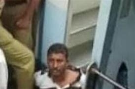 keralanews a s i suspended in the incident of beating train passenger in kannur