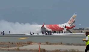 keralanews smoke on air india express flight from muscat to kochi passengers evacuated